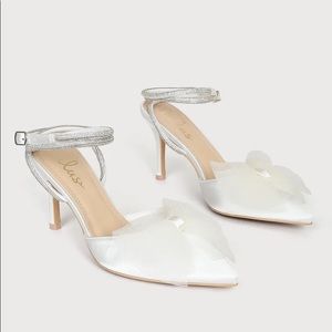 Lulu’s Lelanee White Satin Rhinestone Bow Ankle Strap Pumps